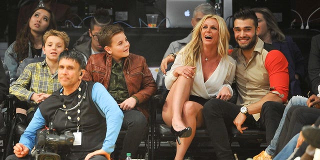 Sean Federline, Jayden James Federline, Britney Spears and Sam Asghari attend a basketball game between the Los Angeles Lakers and the Golden State Warriors at Staples Center on November 29, 2017 in Los Angeles, California. 