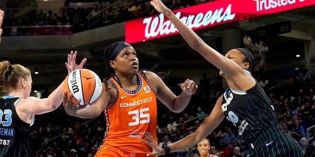 DeWanna Bonner leads Sun to Game 1 semifinal win over the defending WNBA champions 2 Connecticut Sun's Jonquel Jones (35) shoots as Chicago Sky's Azura Stevens defends during the first half in Game 1 of a WNBA basketball semifinal playoff series Sunday, Aug. 28, 2022, in Chicago.