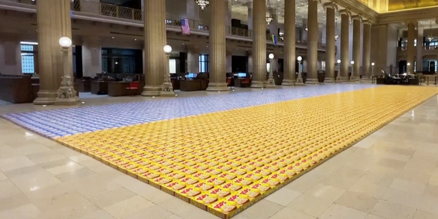 Kellogg's donated the cereal boxes for the Chicago teens to create this record-breaking flag mosaic as a fundraiser.