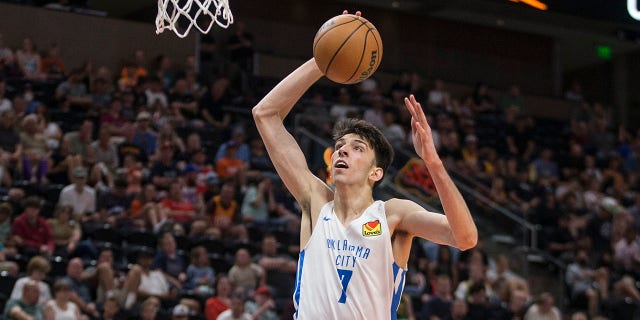 Chet Holmgren #7 of the Oklahoma City Thunder drives to the basket against the Memphis Grizzlies during the first half of their NBA Summer League game July 6, 2022 at the Vivint Smart Home Arena in Salt Lake City, Utah.