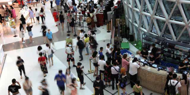 China will close its duty-free mall to curb COVID during the latest outbreak.  Pictured: Sanya International Duty-Free Shopping Complex in Sanya, Hainan Province, China on November 25, 2020.