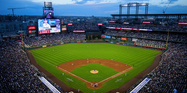 A general view of the Colorado Rockies on the field against the Los Angeles Dodgers in the fifth inning at Coors Field on April 9, 2022 in Denver, Colorado.