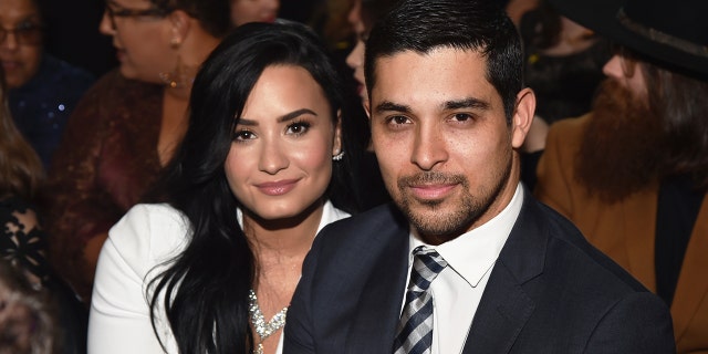 Singer Demi Lovato, left, and actor Wilmer Valderrama attend The 58th GRAMMY Awards at Staples Center on February 15, 2016 in Los Angeles, California.