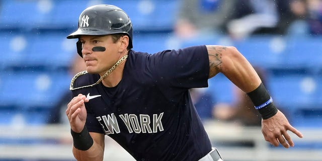 Derek Dietrich of the New York Yankees runs after a hit during the first inning against the Toronto Blue Jays during a spring training game at TD Ballpark March 21, 2021, in Dunedin, Fla.