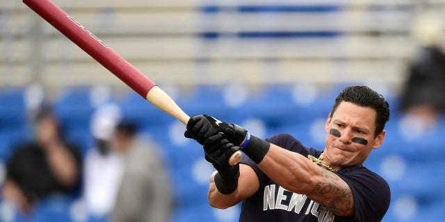 Derek Dietrich of the New York Yankees warms up before a game during spring training at TD Ballpark March 21, 2021, in Dunedin, Fla.