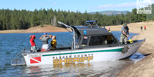 Prosser Creek Reservoir water team of the Pacer County Sherriff's department prepare to search for Kiely Rodni or evidence of her whereabouts