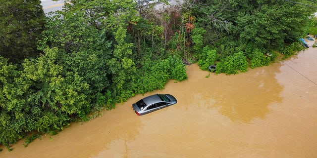 The Kentucky River in Jackson, Kentucky, overflowed its banks on July 28, 2022, and flooded surrounding roads.