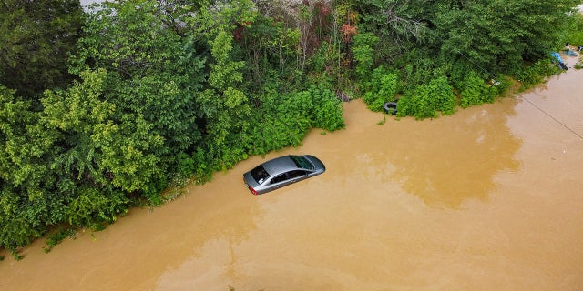 The Kentucky River in Jackson, Kentucky, overflowed its banks on July 28, 2022, and flooded surrounding roads.