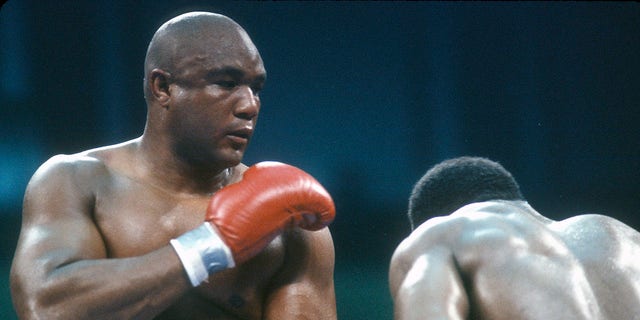 George Foreman fights Evander Holyfield for the WBC, WBA and IBF heavyweight titles at the Convention Hall in Atlantic City, N.J., on April 19, 1991.