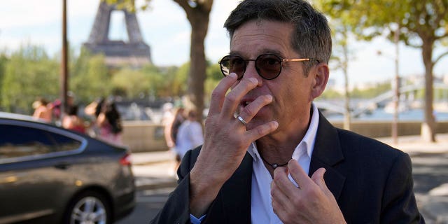 French emergency doctor Frederic Mailliez, who was first to arrive at the crash that killed Britain's Diana, Princess of Wales, speaks to The Associated Press next to the Pont de l'Alma tunnel, in Paris, Wednesday, Aug. 24, 2022. 