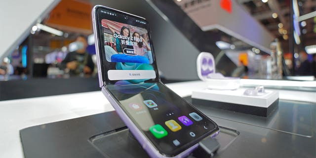 The Galaxy Z Flip3 on display in a store.