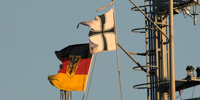 The German flag flutters on the German Navy supply ship Elbe during the arrival for the NATO exercise Baltic MCM Squadex 22 in the port of Riga, Latvia on March 15, 2022. Photo taken on March 15, 2022. 