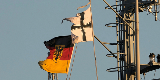 The German flag flutters on the German Navy supply ship Elbe during the arrival for the NATO exercise Baltic MCM Squadex 22 in the port of Riga, Latvia on March 15, 2022. Photo taken on March 15, 2022. 