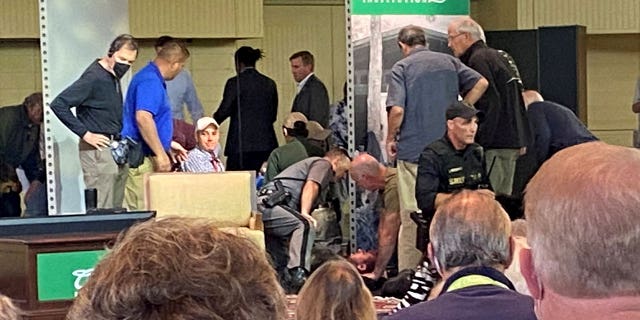 A view of who appears to be author Salman Rushdie treated by emergency personnel after being stabbed on stage before his scheduled speech at the Chautauqua Institution in Chautauqua, New York, U.S., August 12, 2022, in this picture obtained from social media.