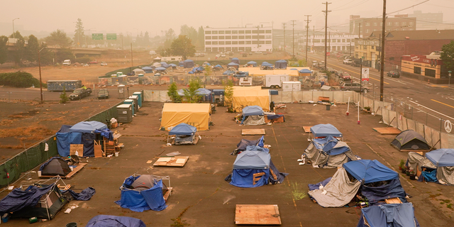 A homeless camp near the east side of the Hawthorne Bridge in Portland, Oregon.