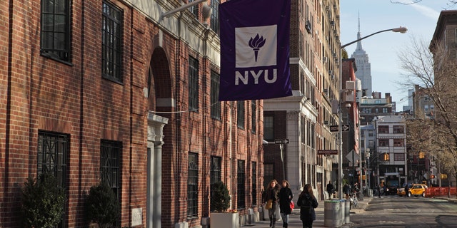Devesh Samtani would have begun his freshman year at New York University in September 2021. NYU buildings on MacDougal Street at 37 Washington Square West in New York City. In the distance, the Empire State Building appears above buildings on West 8th Street.