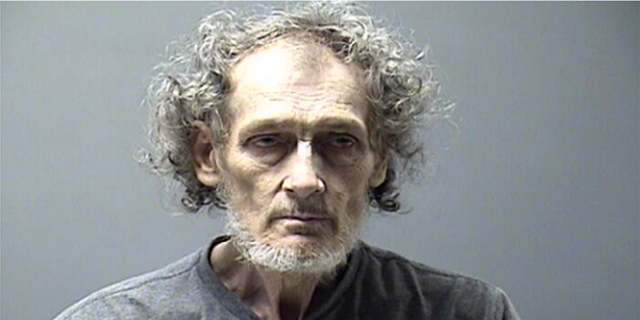 George Edward Dennison, 68, was arrested for attempted murder after he allegedly shot his wife with a crossbow shortly after midnight on Wednesday. 