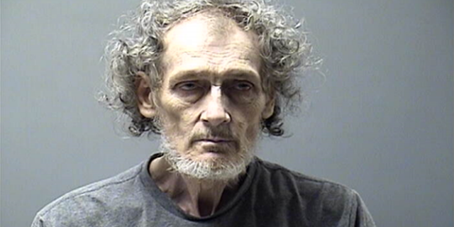 George Edward Dennison, 68, was arrested for attempted murder after he allegedly shot his wife with a crossbow shortly after midnight on Wednesday. 