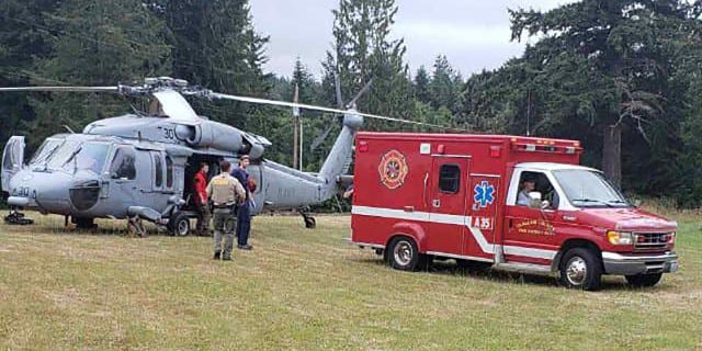 A helicopter crew located the crash site through significant fog in a dense wooded area.