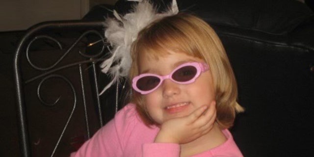 Sydney poses wearing sunglasses and a feather hair accessory. Her mother told Fox News Digital that the child loved dance and softball.