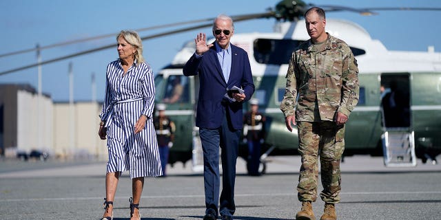 President Joe Biden and First Lady Jill Biden walk toward Air Force One on August 8, 2022.