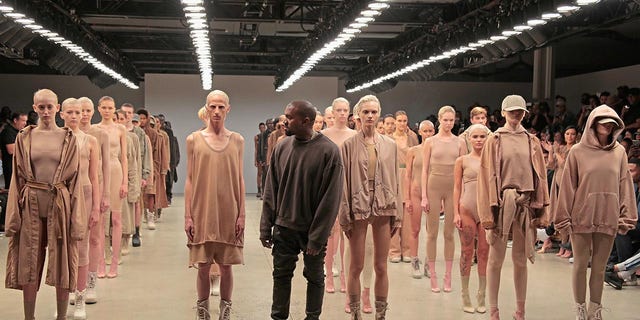 Kanye West poses at the finale of Easy Season 2 during New York Fashion Week at Skylight Modern in New York City on September 16, 2015.  