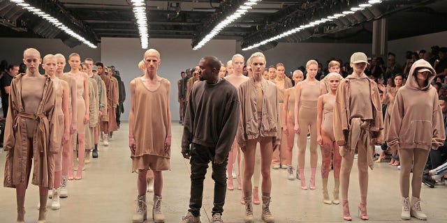 Kanye West poses during the finale of Yeezy Season 2 during New York Fashion Week at Skylight Modern on September 16, 2015, in New York City.  