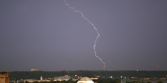 Lightning strikes over the Jefferson Memorial after a severe storm in Washington on June 23, 2015.