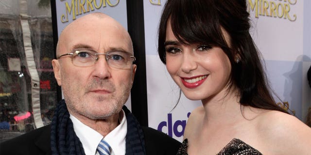 Musician Phil Collins (L) and actress Lily Collins arrive at Relativity Media's "Mirror Mirror" Los Angeles premiere at Grauman's Chinese Theatre on March 17, 2012, in Hollywood, California.  (Photo by Todd Williamson/Getty Images For Relativity Media)