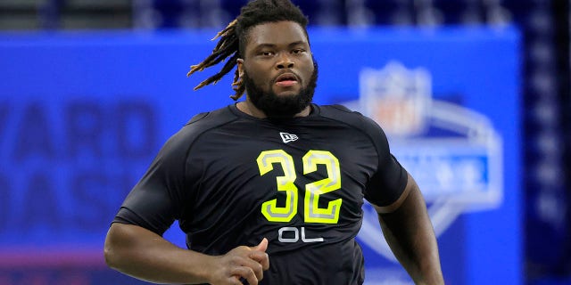 Marcus Mckethan of the North Carolina Tar Heels runs the 40-yard dash during the NFL Combine at Lucas Oil Stadium March 4, 2022, in Indianapolis.