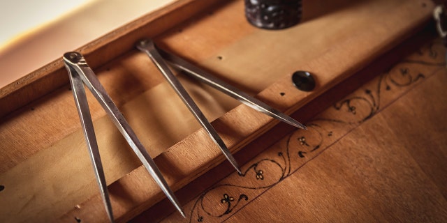 Compasses, Pallavicino Castle, Varano de' Melegari, Parma, Italy, 13th century. Historical reenactment.