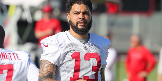 Tampa Bay Buccaneers wide receiver Mike Evans (13) goes through a drill during the team's minicamp June 7, 2022, at the AdventHealth Training Center in Tampa, Fla.