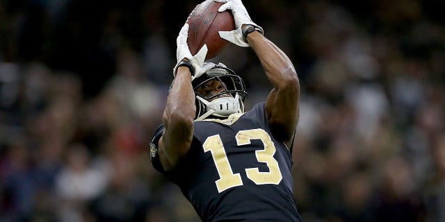 Michael Thomas of the New Orleans Saints catches a 3-yard touchdown pass against the Carolina Panthers at Mercedes-Benz Superdome Nov. 24, 2019, in New Orleans.