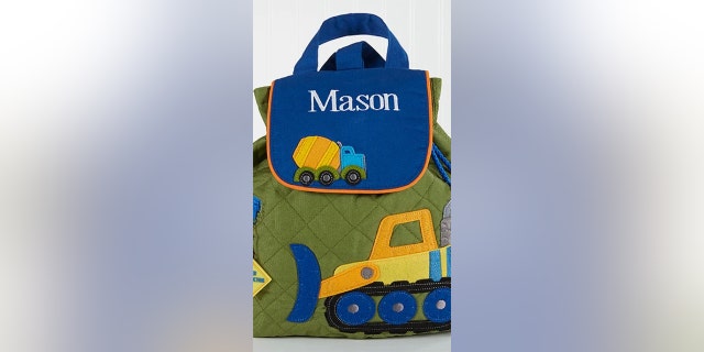 This personalized backpack is machine washable and 100% cotton/poly quilted twill.