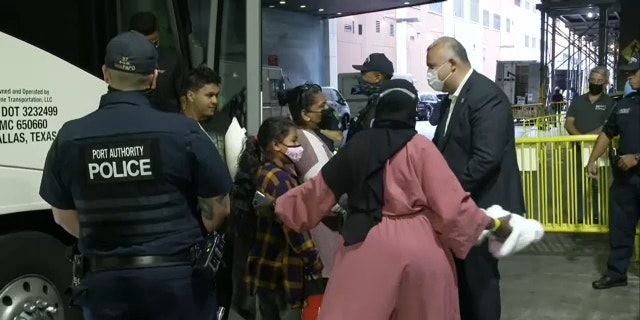 Migrant women and children arrive by bus from Texas to Port Authority on Aug. 15, 2022. 