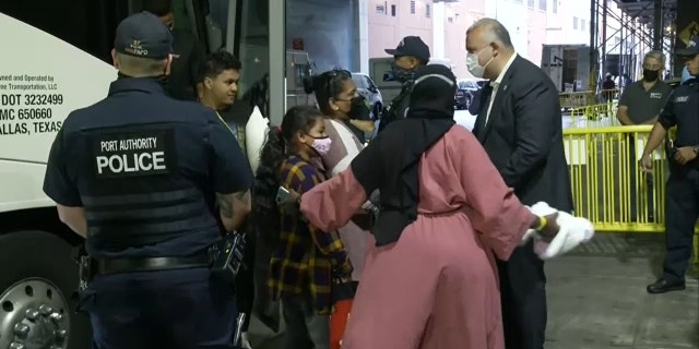 Migrant women and children arrive by bus from Texas to Port Authority on Aug. 15, 2022.