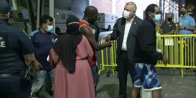 NYC Commissioner of Immigrant Affairs Manuel Castro greets migrants at Port Authority on Aug. 15, 2022.