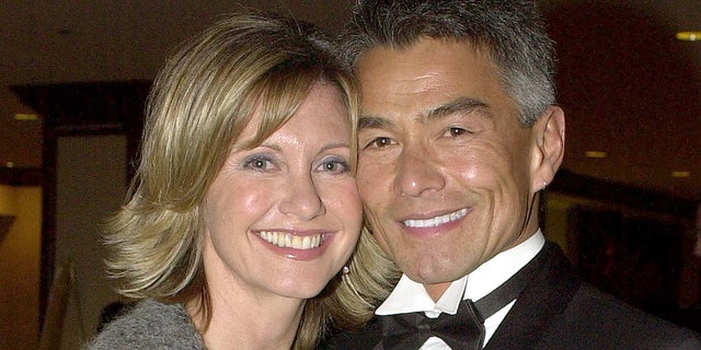 Olivia Newton-John dated Patrick McDermott for nine years before he mysteriously vanished in 2005. The former couple were pictured in 2001.