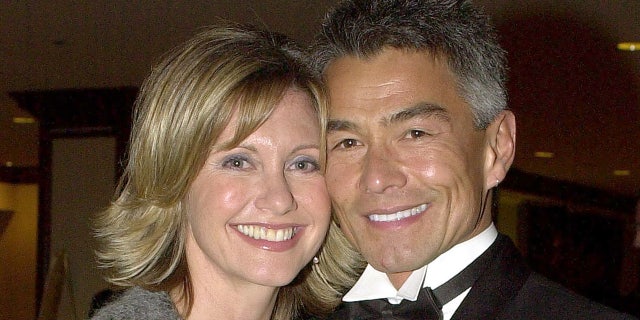 Olivia Newton-John dated Patrick McDermott for nine years before he mysteriously vanished in 2005. The former couple were pictured in 2001.