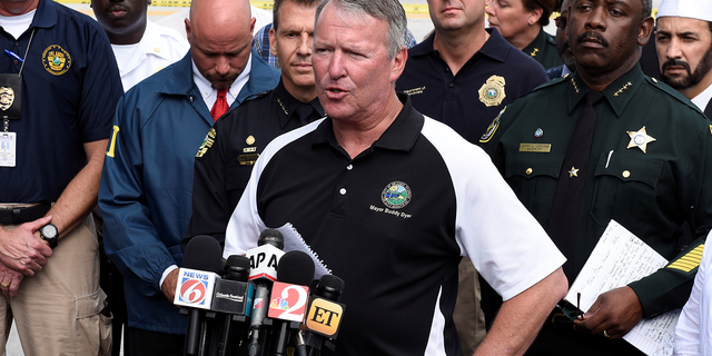 Orlando Mayor Buddy Dyer speaks at a news conference after a shooting attack at Pulse nightclub in Orlando, Florida, U.S. June 12, 2016. REUTERS/Kevin Kolczynski