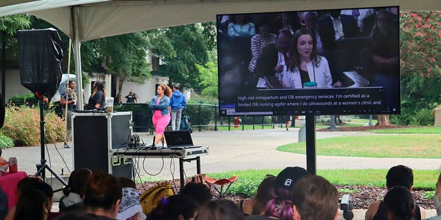 Supporters of abortion rights gather to watch the South Carolina Senate Medical Affairs Committee hearing on abortion outside the statehouse, Wednesday, Aug. 17, 2022, in Columbia, S.C. 