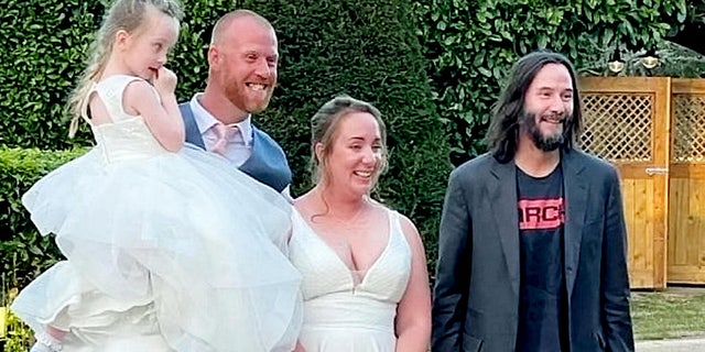 Keanu Reeves crashed a couple's wedding in England.