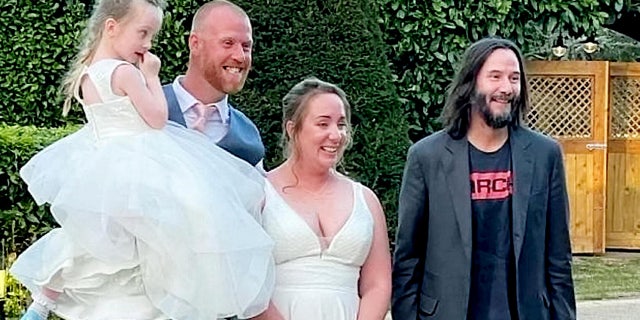 Keanu Reeves crashed a couple's wedding in England.