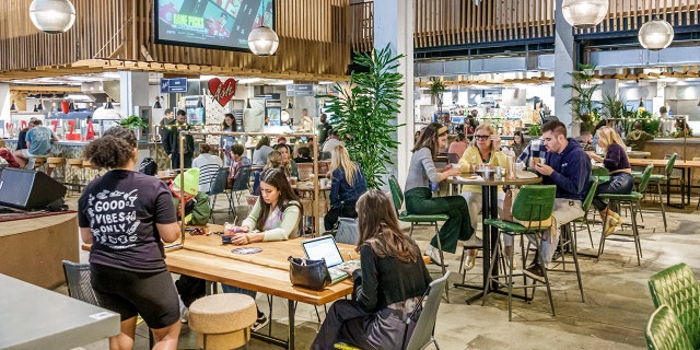 In Miami, Florida, a busy food court and dining area.