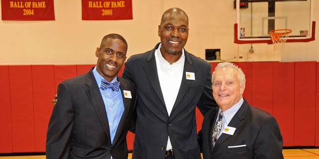 Vernon Maxwell, Hakeem Olajuwon and Leslie Alexander pose for a photo at the Houston Rockets Anniversary Luncheon honoring the 1994 and 1995 winning teams at the Toyota Center in Houston on March 19, 2015.