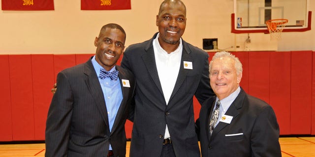 Vernon Maxwell, Hakeem Olajuwon and Leslie Alexander pose for a photo during the Houston Rockets Anniversary Luncheon honoring the 1994 and the 1995 championship teams March 19, 2015, at the Toyota Center in Houston.