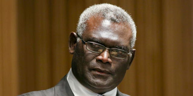 FILE - Manasseh Sogavare, Prime Minister of Solomon Islands attends a Lowy Institute event in Sydney, Monday Aug. 14, 2017. 