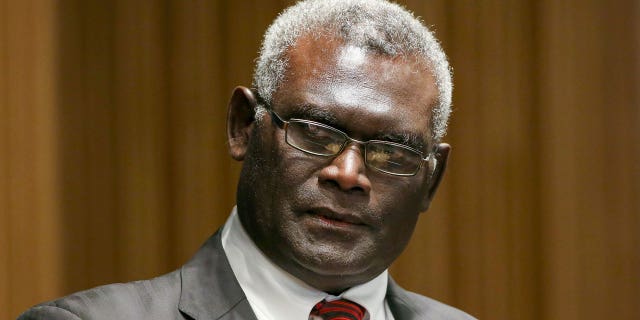 FILE - Manasseh Sogavare, Prime Minister of Solomon Islands attends a Lowy Institute event in Sydney, Monday Aug. 14, 2017.