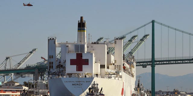 The USNS Mercy hospital ship enters the Port of Los Angeles, March 27, 2020.