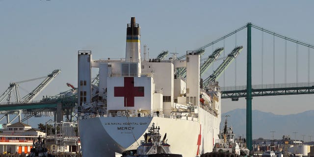 The USNS Mercy hospital ship enters the Port of Los Angeles, March 27, 2020.